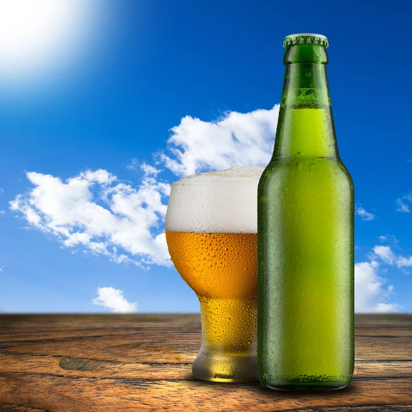 Glass and bottle of beer — Stock Photo, Image