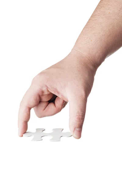 Hand hält Puzzle — Stockfoto