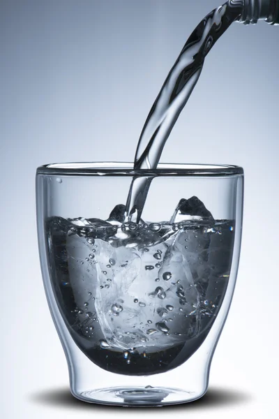 Water pour into glass — Stock Photo, Image