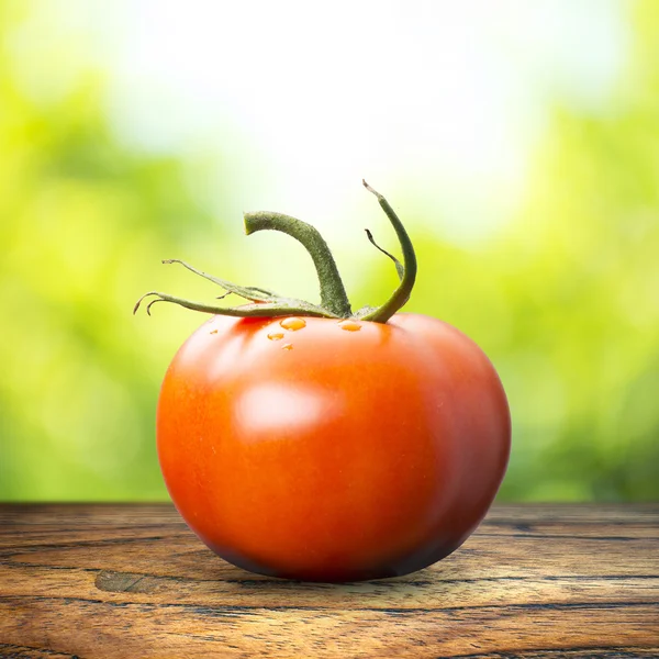 Tomato On Wood Table — Stock Photo, Image
