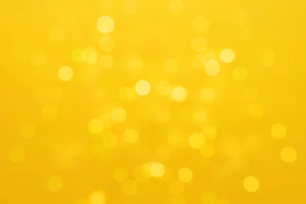Beautiful Yellow Festive Background Blurry Lights Copy Space lizenzfreie Stockfotos
