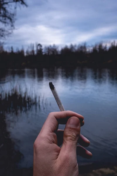 Beautiful Stylized White Hand Holding Handmade Marijuana Joint Cannabis Cigarette — Stock Photo, Image