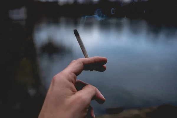 Beautiful Stylized White Hand Holding Handmade Marijuana Joint Cannabis Cigarette — Stock Photo, Image