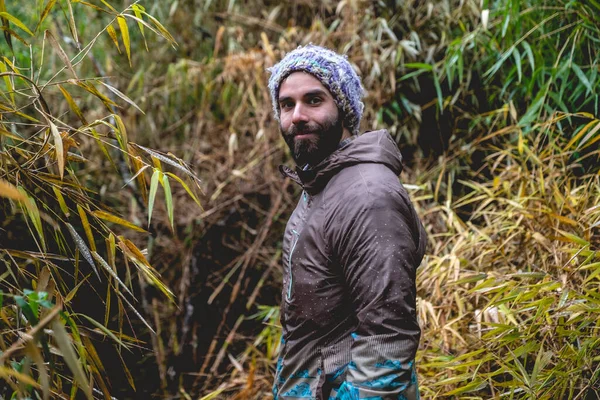 Handsome Bearded Happy Young Guy Wool Cap Jacket Nature Green — Fotografia de Stock