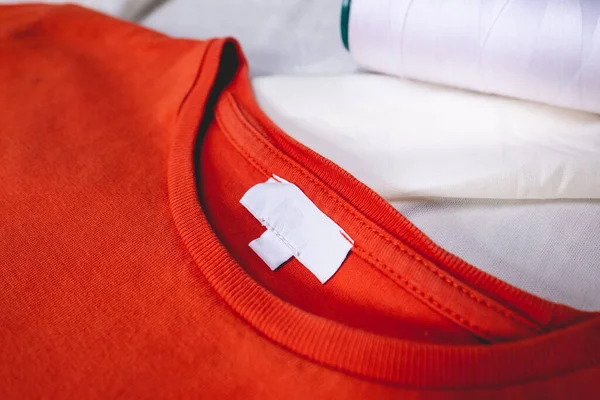 Neck Label Detail Fashion Orange Cotton Shirt Wrinkled White Sheet —  Fotos de Stock