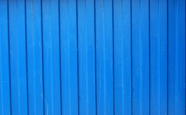Textura de valla metálica corrugada pintada con pintura azul — Foto de Stock