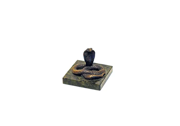 Figure bronze snake on a piece of green marble — Stock Photo, Image