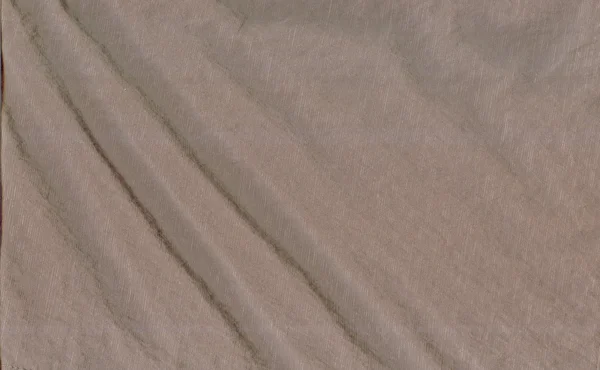 Texture of beige raincoat fabrics with folds as background — Stock Photo, Image
