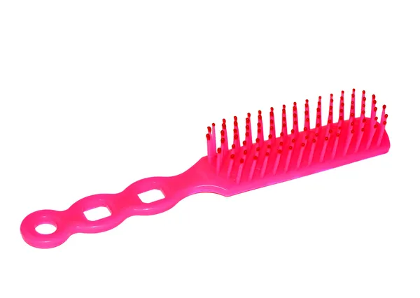Escova de cabelo de plástico rosa brilhante — Fotografia de Stock