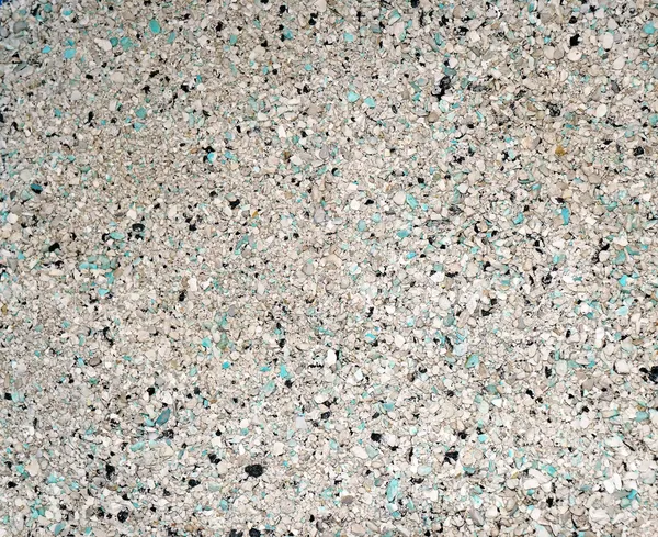 Background of small blue, gray, white and black small granules ( — Stock Photo, Image