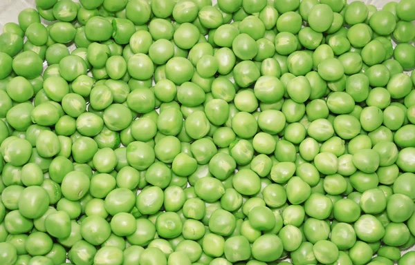 Kacang polong hijau sebagai latar belakang — Stok Foto
