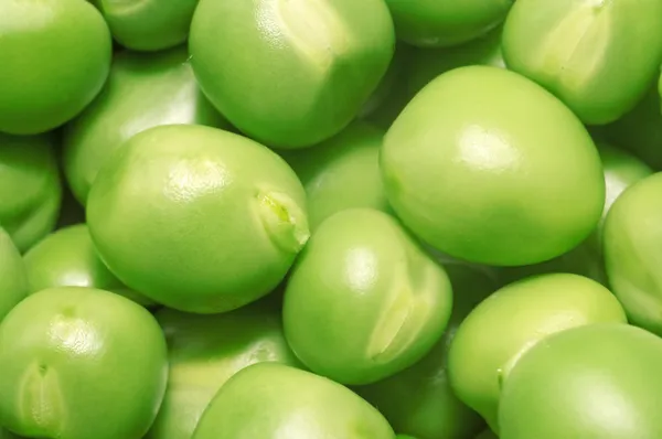 Kacang polong hijau close-up sebagai latar belakang — Stok Foto