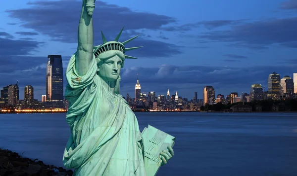 The Statue of Liberty and New York City Stock Image