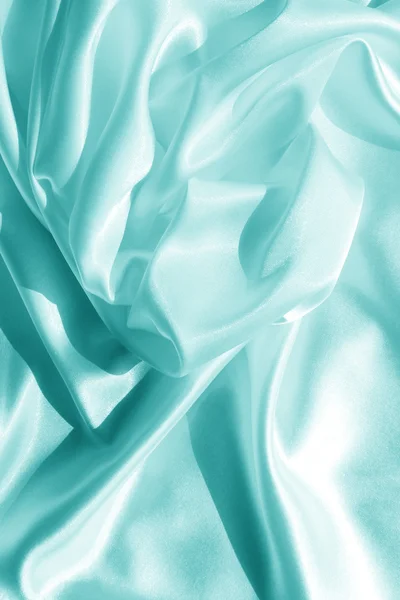 Blue satin fabric as background to insert text or design — Stock Photo, Image