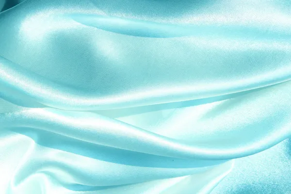 Blue satin fabric as background to insert text or design — Stock Photo, Image