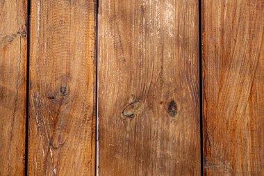 Ahşap kalasların arka planı. Kahverengi, arka plan olarak kırmızı tahta. Metin için arkaplan dokusu. Masa ahşap. Güzel tahta tahtalar.