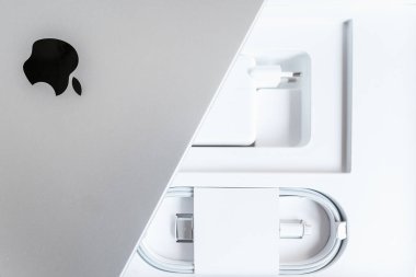 Zaragoza, Spain - NOV 14 2021: Apple MacBook Pro 2021 with M1 silicon Chip. Laptop with black Apple logo on top of the box than includes charger and cables