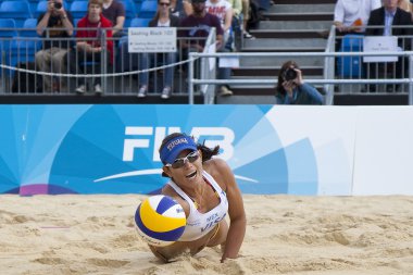 Mayra Garcia (MEX) dives for the ball during the FIVB International Beach Volleyball tournament