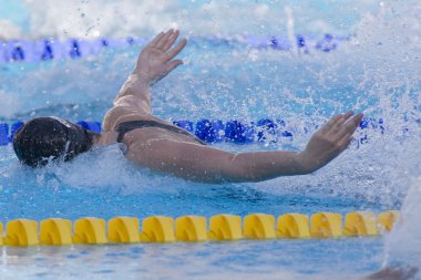 Kay: Dünya Su Sporları Şampiyonası - Kadınlar 100m kelebek yarı final. Christine magnuson.