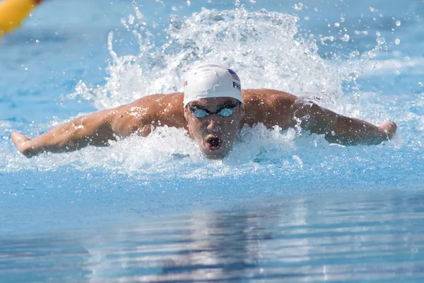 Чемпионат мира по водным видам спорта - мужчины 100 м баттерфляем. Фелпс, Майкл Стоковое Фото