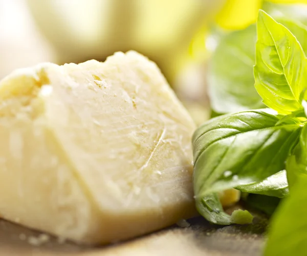 Parmesan cheese on a wooden board — Stock Photo, Image