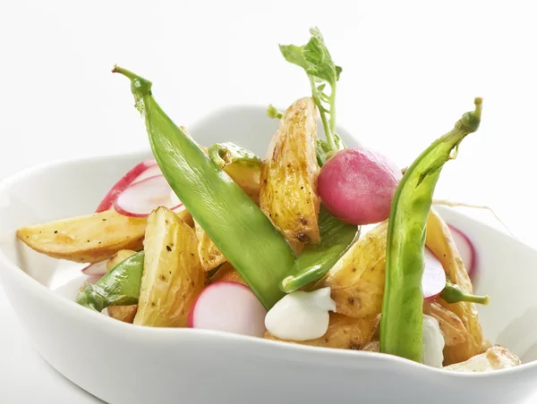 Fresh healthy radish sprout salad with apricot and broccoli sideview — Stock Photo, Image