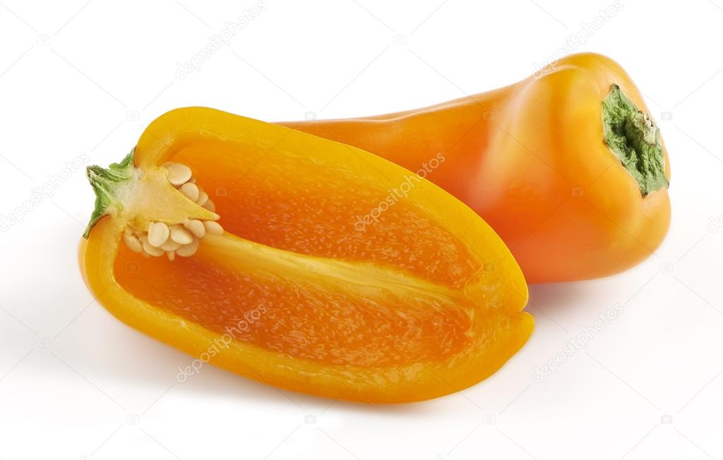 two orange mini bell peppers on a white background