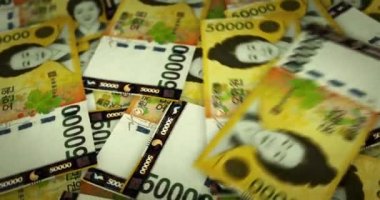 Güney Kore Galibiyeti giderek artan para yığını. KRW banknotları dönüyor. Kusursuz ve döngülü finans kavramı, ekonomi krizi, enflasyon ve iş dünyası.