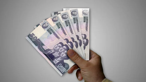 Noord Korea Won Stapel Geld Hand Illustratie Achtergrondconcept Kpw Bankbiljetten — Stockfoto