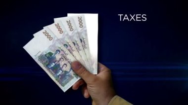 Cezayir Dinar kâğıdı. DZD banknotlarının hayranı. Gelir kaybı, yaşam, vergi, kredi ve para kaybı metaforu.