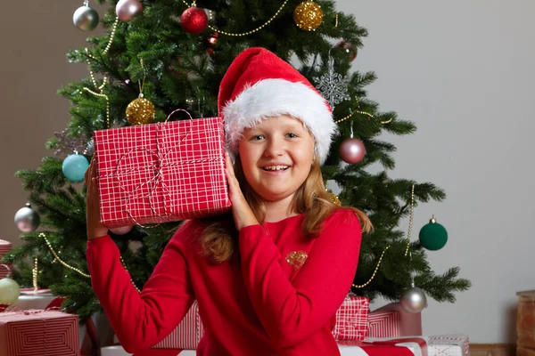 Happy Little Girl Holding Box Gift Child Santa Hat Background Royalty Free Stock Images