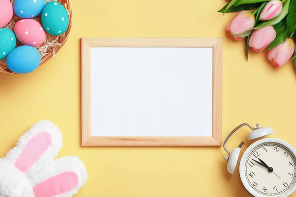 Easter Composition Frame Eggs Tulips Alarm Clock Yellow Background Flat — ストック写真