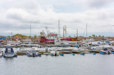 Lindesnes, Norway - July 21 2019: Small and large boats at Baly harbour.