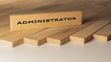 Administrator written on wooden surface. Concept created from wooden sticks
