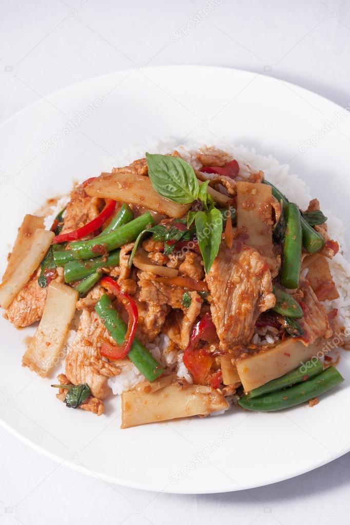 Thai spicy food, stir fried chicken whit basil and rice.
