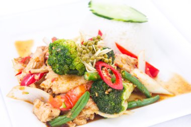 Stir fried spicy Thai herbs with jasmine rice.
