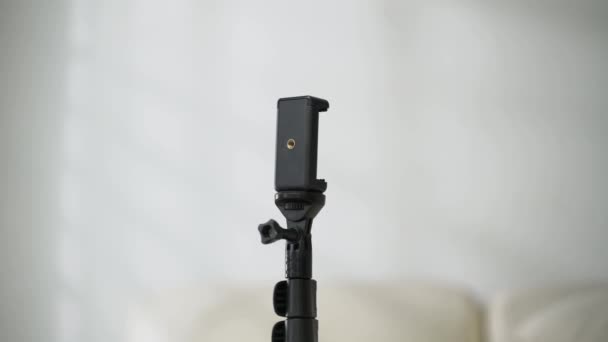 Zoom Black Tripod White Background — Stock Video