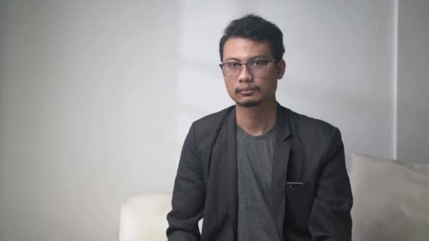 Handsome Asian Man Glasses Hanging Headphones His Neck — Stock Video