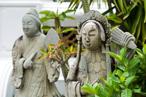 La muñeca china de piedra en el templo —  Fotos de Stock