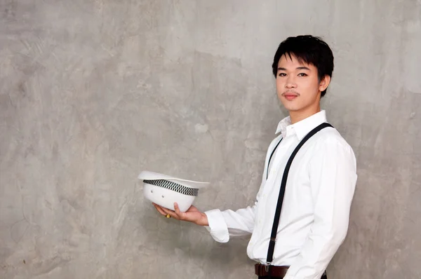 A teenager boy holds hat in his hand — Stock Photo, Image