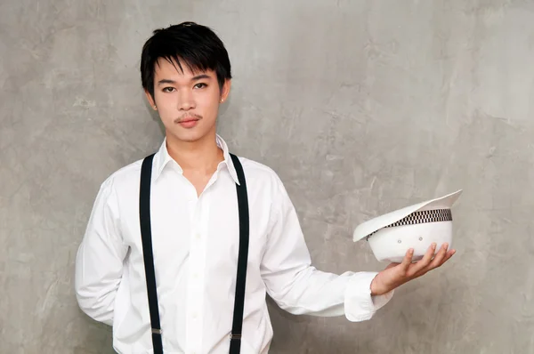 A teenager boy holds hat in his hand — Stock Photo, Image