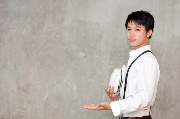 A teenager boy holds hat in his hand — Stock Photo, Image