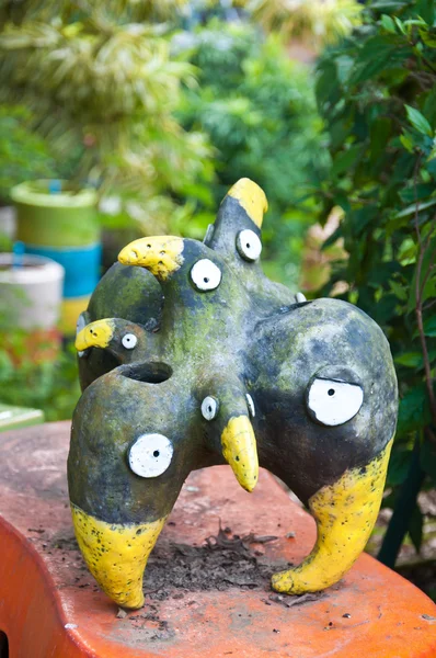 The pottery as crow with many head — Stock Photo, Image