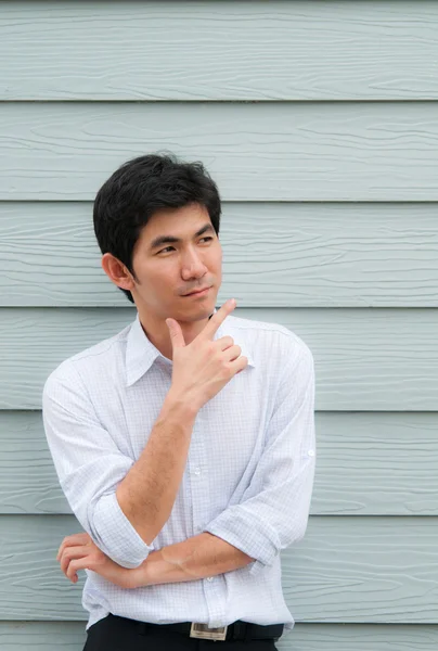 An asian man cross his arm as thinking — Stock Photo, Image