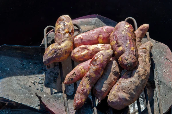 The grilled sweet potato on the roaster — Stock Photo, Image