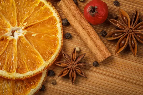 Kitchen herbs with dried orange — Stock Photo, Image