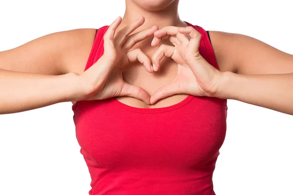 Woman in making heart shape sign. — Stock Photo, Image
