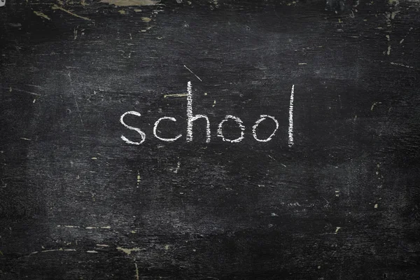 Chalk on black board: school — Stock Photo, Image