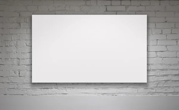 Bild einer leeren Plakatwand über einer weißen Ziegelwand — Stockfoto
