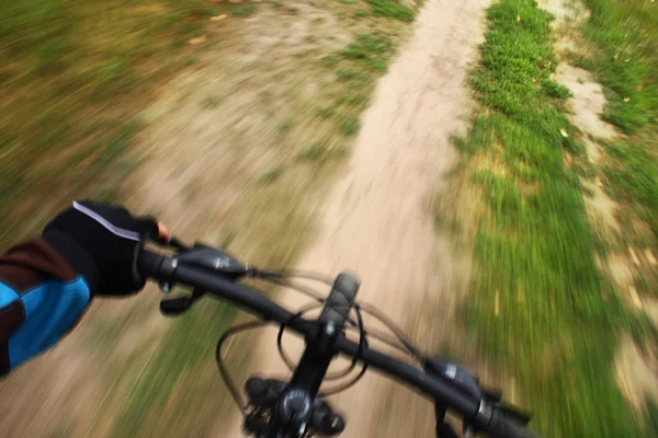 Riding mountain bike — Stock Photo, Image